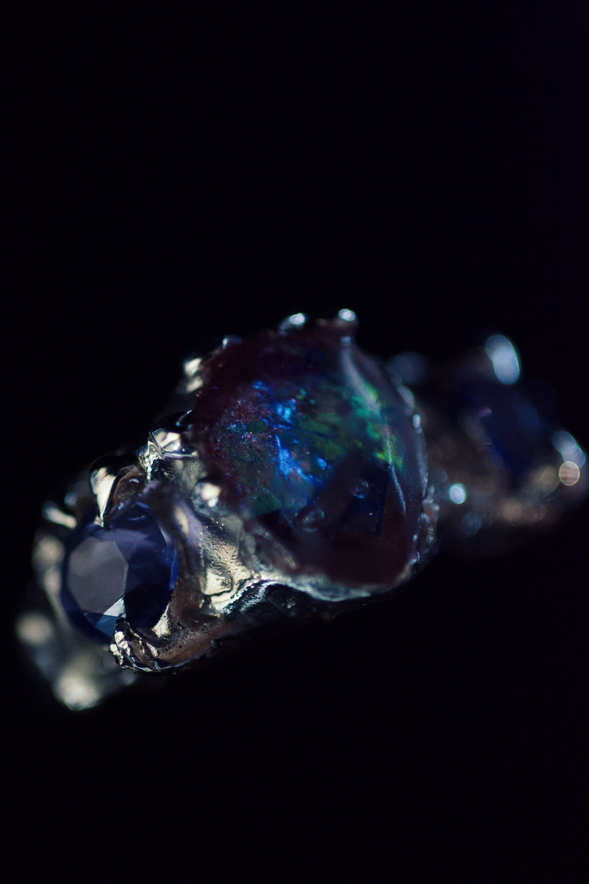 Lost wax ethereal ring cast in sterling silver and hand carved from jewellers wax.