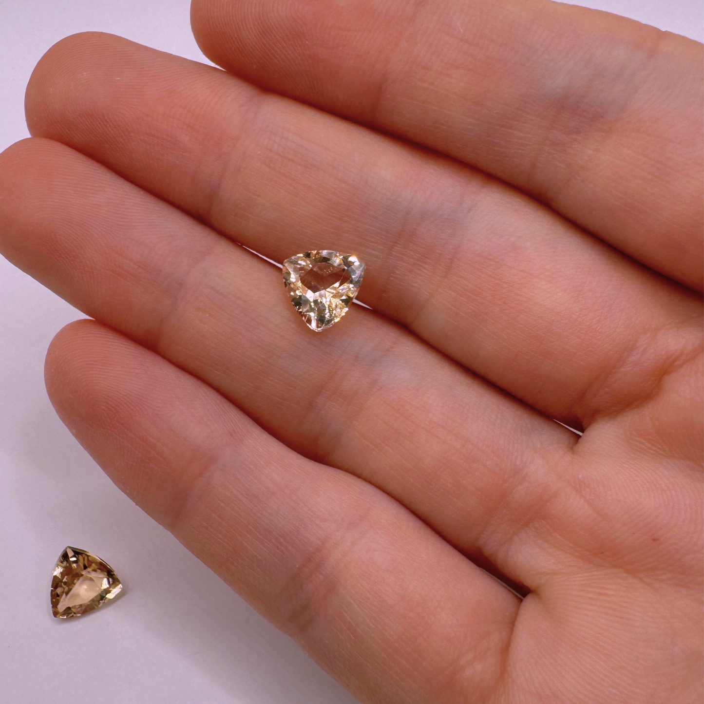 Stunning 8x8mm tri-shaped high-quality peachy pink morganite crystal, perfect for vibrant and creative jewellery designs using lost wax techniques.